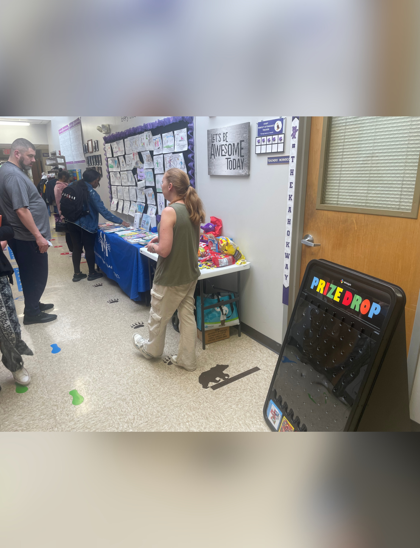 Beck chats with families at the MVLD’s outreach table during a recent event.