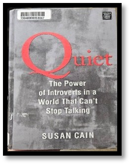 A book with a barcode on the front cover's upper left corner