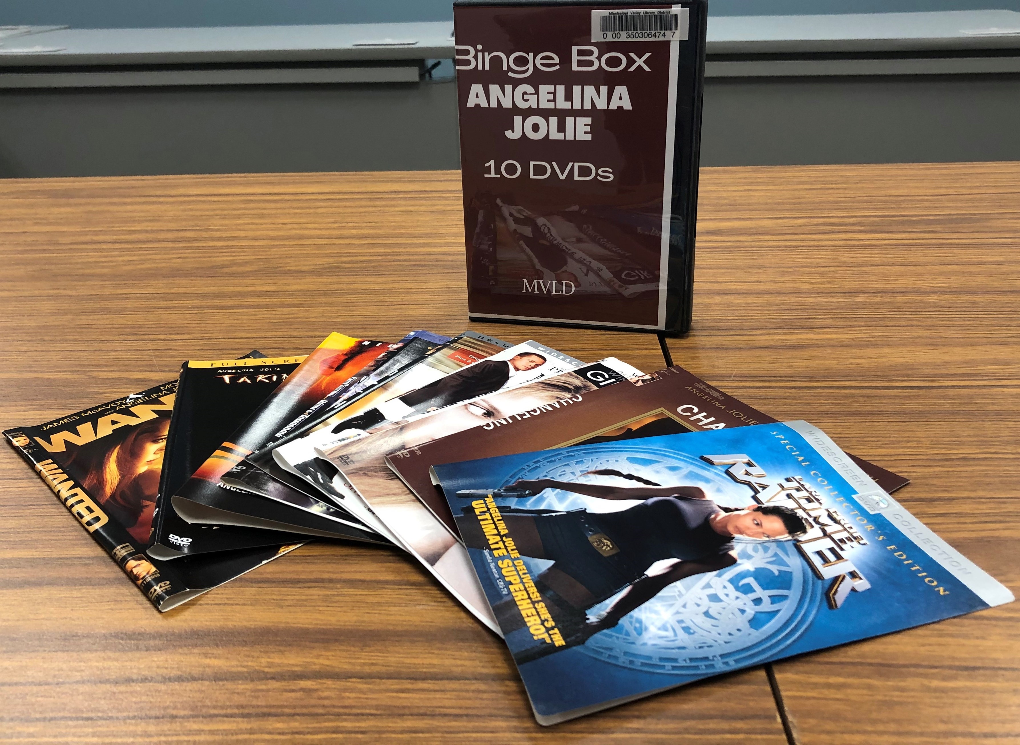 A photo of the Angelina Jolie binge box and several booklets