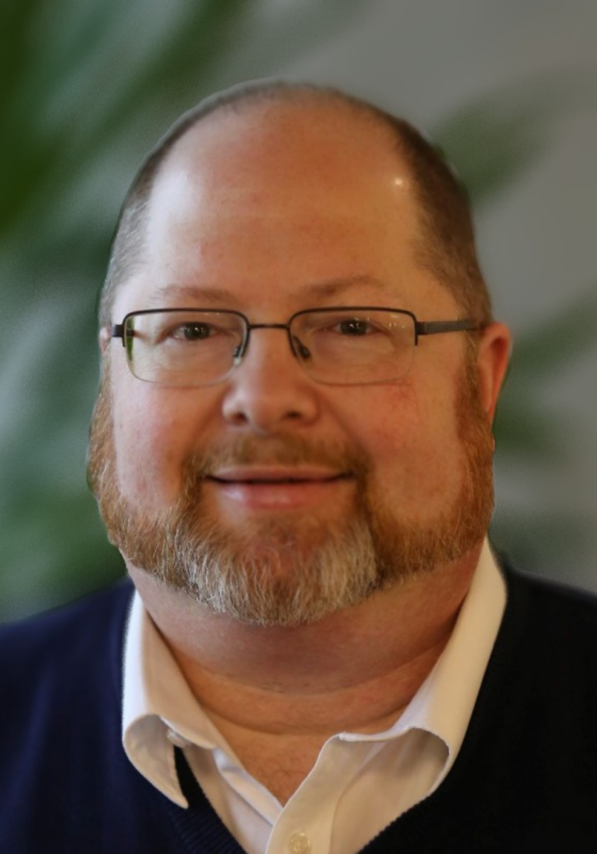 Blake Walter headshot. Photo of a white man with short hair and glasses.