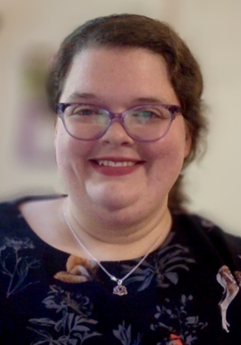 Mary Cornell headshot. A white woman with glasses and brown hair.